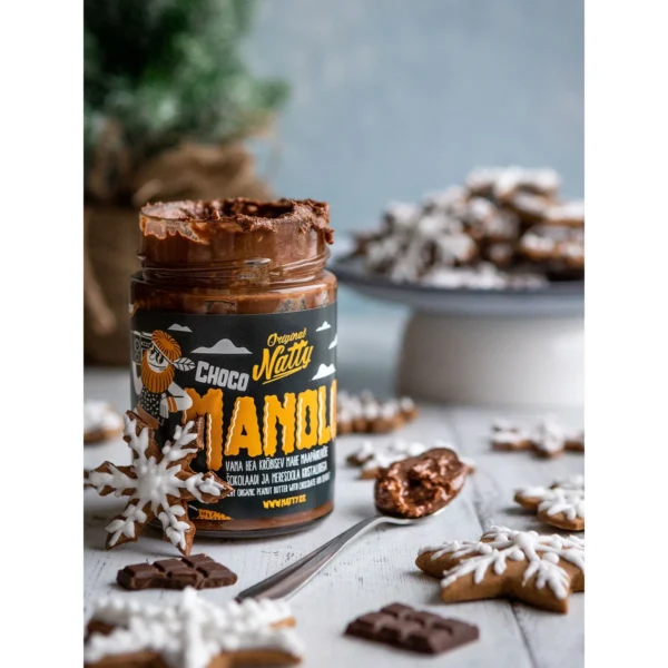 Natty Choco Manolo jar next to gingerbread biscuits and nuts