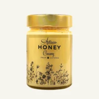 Creamy blossom honey in a 430 g jar