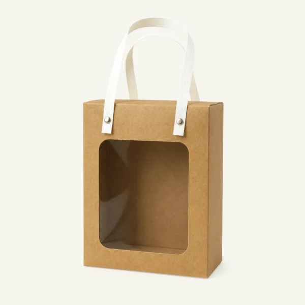 Empty natural cardboard gift box with a window and light-coloured handles