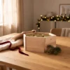 Six honeys and tea VIP gift box in a warm Christmas gifting setting.