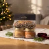 Two-honey and herbal tea gift set 2 × 100 g – blossom honey and honey with sea buckthorn in a warm Christmas gifting setting.