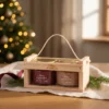 Two-honey gift set in a wooden crate 2 × 100 g – honey with cranberries and honey with wild berries in a warm Christmas gifting setting.