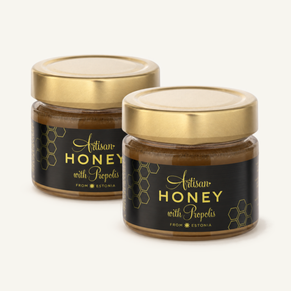 Mesi taruvaiguga 200 g – kaks Artisan Honey purki kuldsete kaantega.